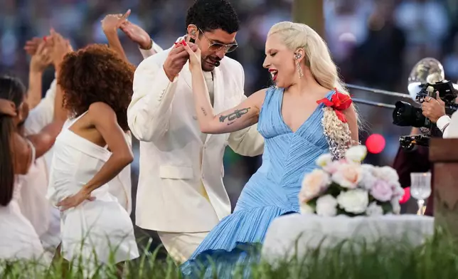 Bad Bunny and Lady Gaga perform during halftime of the NFL Super Bowl 60 football game between the New England Patriots and the Seattle Seahawks, Sunday, Feb. 8, 2026, in Santa Clara, Calif. (AP Photo/Lynne Sladky)