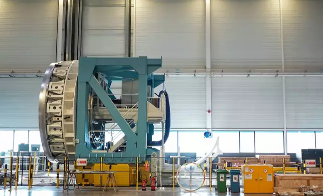 A partial view of assembly line of the Ariane 64 rocket, in Les Mureaux, west of Paris, Wednesday, Feb. 4, 2026. (AP Photo/Thibault Camus)