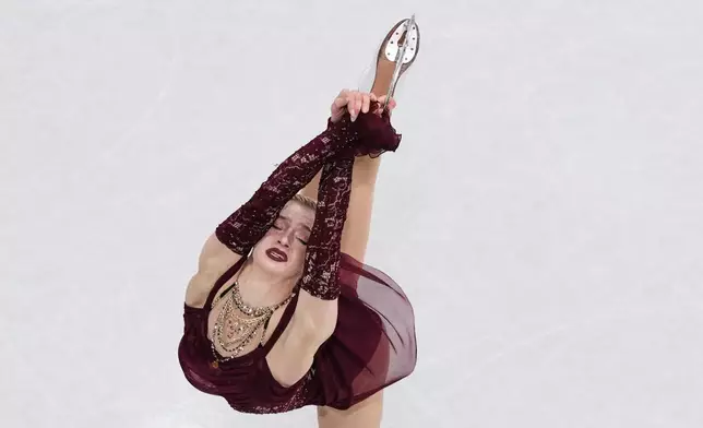 Amber Glenn of the United States competes during the women's short program figure skating at the 2026 Winter Olympics, in Milan, Italy, Tuesday, Feb. 17, 2026. (AP Photo/Bernat Armangue)