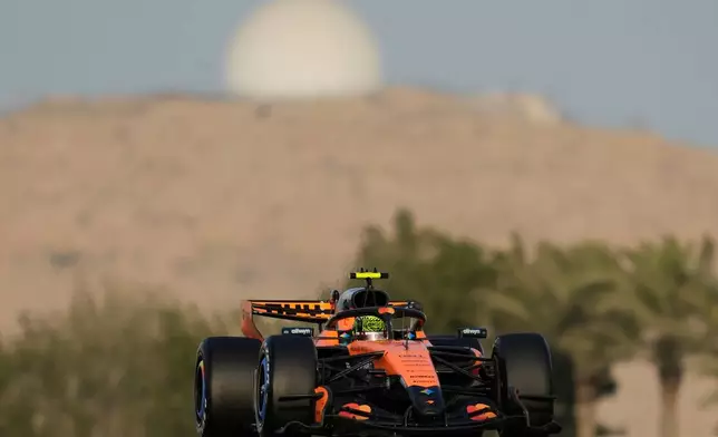 McLaren driver Lando Norris of Britain steers his car during a Formula One pre-season test at the Bahrain International Circuit in Sakhir, Bahrain, Wednesday, Feb. 11, 2026. (AP Photo/Altaf Qadri)