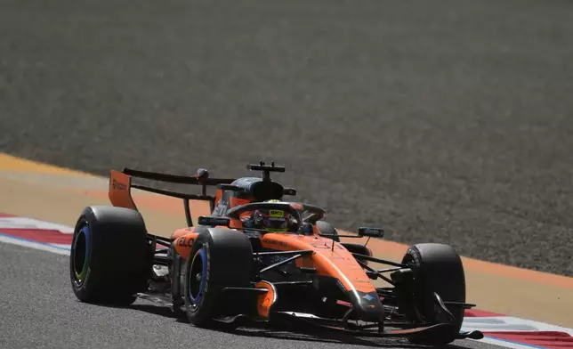 McLaren driver Oscar Piastri of Australia steers his car during a Formula One pre-season test at the Bahrain International Circuit in Sakhir, Bahrain, Wednesday, Feb. 11, 2026. (AP Photo/Altaf Qadri)