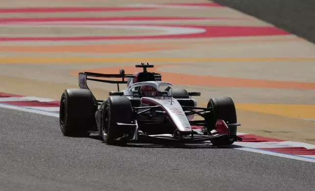 Haas driver Esteban Ocon of France steers his car during a Formula One pre-season test at the Bahrain International Circuit in Sakhir, Bahrain, Wednesday, Feb. 11, 2026. (AP Photo/Altaf Qadri)
