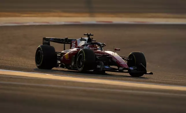 Ferrari driver Charles Leclerc of Monaco steers his car during a Formula One pre-season test at the Bahrain International Circuit in Sakhir, Bahrain, Wednesday, Feb. 11, 2026. (AP Photo/Altaf Qadri)