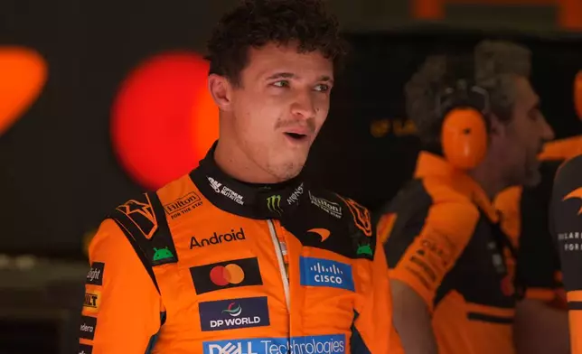 McLaren driver Lando Norris of Britain reacts during a Formula One pre-season test at the Bahrain International Circuit in Sakhir, Bahrain, Wednesday, Feb. 11, 2026. (AP Photo/Altaf Qadri)