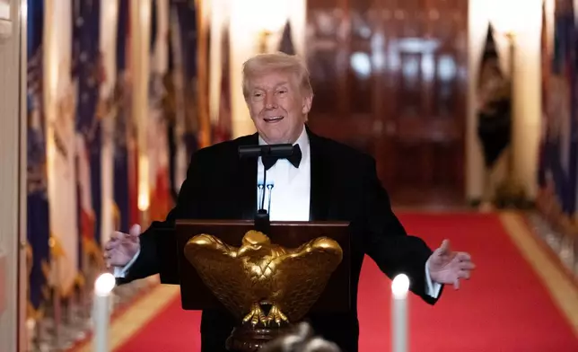 President Donald Trump speaks at the National Governors Association dinner at the White House, Saturday, Feb. 21, 2026, in Washington. (AP Photo/Allison Robbert)