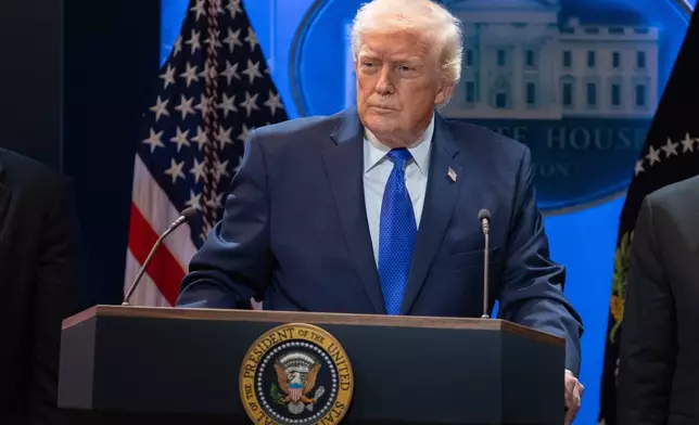 President Donald Trump speaks during a press briefing at the White House, Friday, Feb. 20, 2026, in Washington. (AP Photo/Allison Robbert)