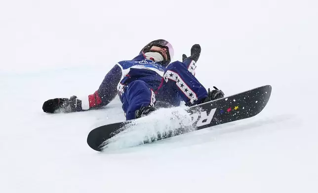 United States' Chloe Kim falls during the women's snowboarding halfpipe finals at the 2026 Winter Olympics, in Livigno, Italy, Thursday, Feb. 12, 2026. (AP Photo/Abbie Parr)