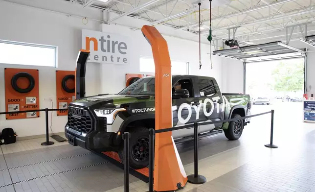 A truck passes through ACV’s VIPER inspection towers, where AI-powered imaging captures vehicle condition in seconds to generate a standardized digital condition summary and real-time valuation range.