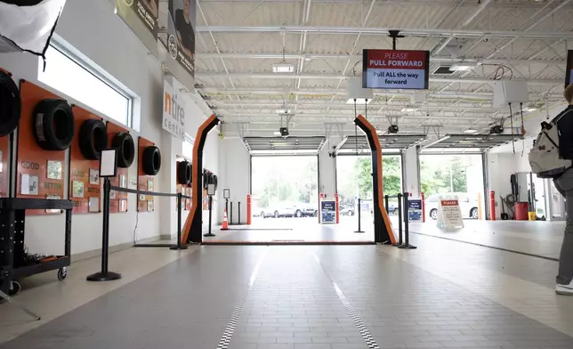 ACV’s VIPER inspection towers installed in a dealership service drive, designed with a compact footprint that fits easily into existing lanes while enabling AI-powered vehicle condition capture.