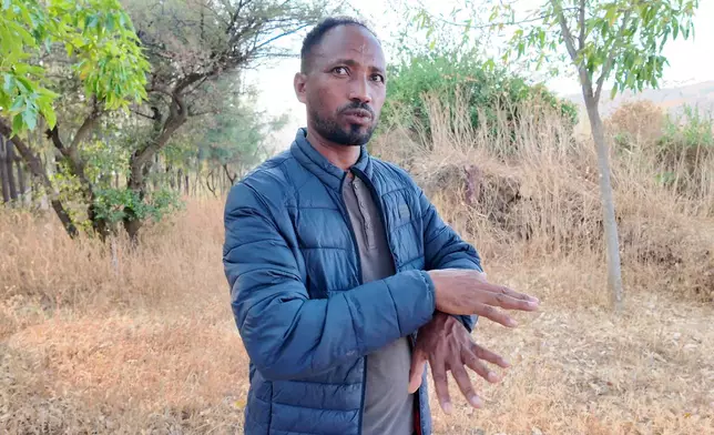 Gebreegziabher Berehe, a tour operator, gestures during an interview with The Associated Press in Mekelle, in the Tigray region of northern Ethiopia, on Jan. 26, 2026. (AP Photo/Jody Ray)