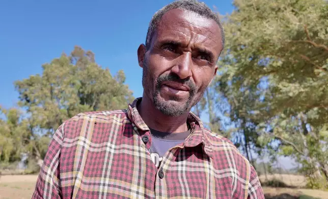 Johannes Tesfay, a farmer, poses for a photo during an interview with The Associated Press in the Tigray region of northern Ethiopia, on Jan. 27, 2026. (AP Photo/Jody Ray)