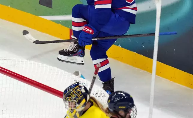 United States' Abbey Murphy (37) celebrates after scoring a goal against Sweden during the second period of a women's ice hockey semifinal match at the 2026 Winter Olympics, in Milan, Italy, Monday, Feb. 16, 2026. (AP Photo/Carolyn Kaster)