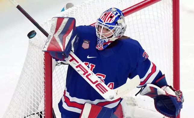 United States goalkeeper Aerin Frankel blocks a shot by Sweden during the second period of a women's ice hockey semifinal match at the 2026 Winter Olympics, in Milan, Italy, Monday, Feb. 16, 2026. (AP Photo/Carolyn Kaster)