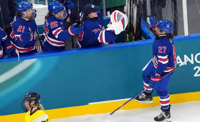 United States' Taylor Heise (27) celebrates after scoring a goal against Sweden during the second period of a women's ice hockey semifinal match at the 2026 Winter Olympics, in Milan, Italy, Monday, Feb. 16, 2026. (AP Photo/Carolyn Kaster)