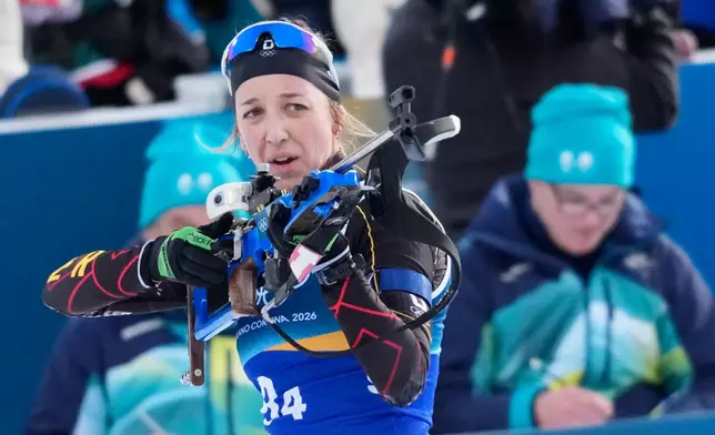 Germany's Franziska Preuss shoots during the 4x6-kilometer mixed relay biathlon race at the 2026 Winter Olympics, in Anterselva, Italy, Sunday, Feb. 8, 2026. (AP Photo/David J. Phillip)