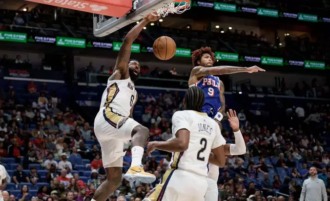 New Orleans Pelicans center DeAndre Jordan (6) dunks against Philadelphia 76ers guard Kelly Oubre Jr. (9) during the first half of an NBA basketball game in New Orleans, Saturday, Feb. 21, 2026. (AP Photo/Matthew Hinton)
