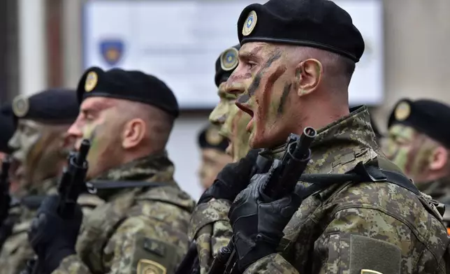 Kosovo Security Force members march during celebrations to mark the 18th anniversary of independence, in Pristina, Kosovo, Tuesday, Feb. 17, 2026. (AP Photo/Laura Hasani)
