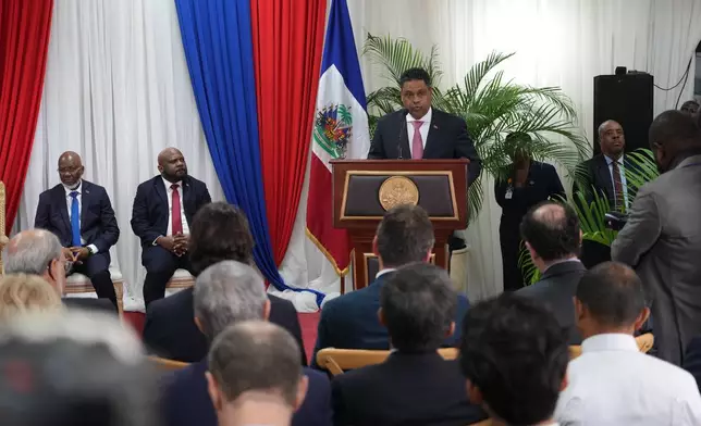 Presidential Council Chair Laurent Saint-Cyr speaks during a ceremony marking the end of the transitional council's almost two-year rule, in Port-au-Prince, Saturday, Feb. 7, 2026. (AP Photo/Odelyn Joseph)