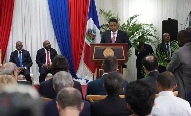 Presidential Council Chair Laurent Saint-Cyr speaks during a ceremony marking the end of the transitional council's almost two-year rule, in Port-au-Prince, Saturday, Feb. 7, 2026. (AP Photo/Odelyn Joseph)