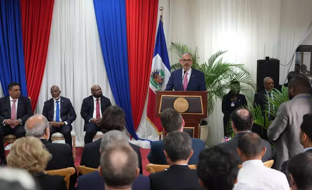 Haitian Prime Minister Alix Didier Fils-Aimé speaks during the ceremony marking the end of the presidential council in Port-au-Prince, Haiti, Saturday, Feb. 7, 2026. (AP Photo/Odelyn Joseph)