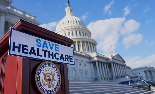 FILE - A podium is prepared before Democrats hold news conference on the health care funding fight on the steps of the House before votes to end the government shutdown on Capitol Hill, Nov. 12, 2025, in Washington. (AP Photo/Mariam Zuhaib, File)