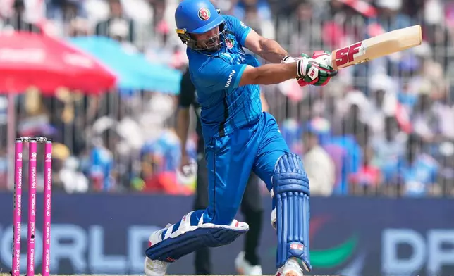 Afghanistan's Gulbadin Naib plays a shot during the T20 World Cup cricket match between Afghanistan and New Zealand in Chennai, India, Sunday, Feb. 8, 2026. (AP Photo/Mahesh Kumar A.)