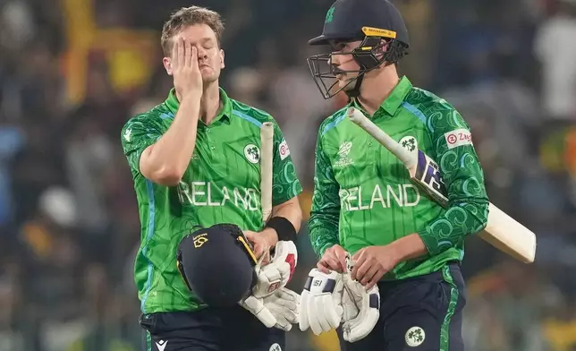 Ireland's Matthew Humphreys and Barry McCarthy after loosing the match during the T20 World Cup cricket match between Sri Lanka and Ireland in Colombo, Sri Lanka, Sunday, Feb. 8, 2026. (AP Photo/Eranga Jayawardena)
