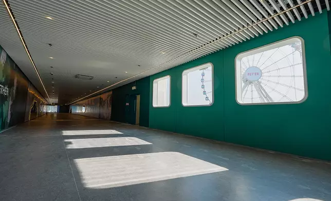 The passageway’s multiple windows bring in natural light