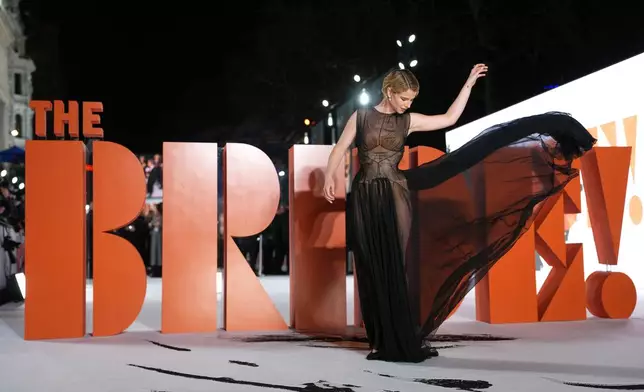Jessie Buckley poses for photographers upon arrival at the World premiere for the film "The Bride" in London, Thursday, Feb. 26, 2026. (Photo by Scott A Garfitt/Invision/AP)