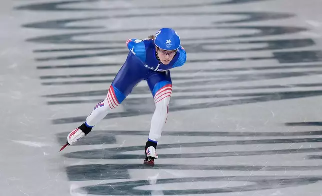 Greta Myers of the U.S. breaks away from the pack in the women's mass start semifinal speedskating races at the 2026 Winter Olympics, in Milan, Italy, Saturday, Feb. 21, 2026. (AP Photo/Luca Bruno)