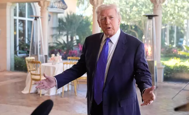 President Donald Trump speaks to reporters at his Mar-a-Lago club, Sunday, Feb. 1, 2026, in Palm Beach, Fla. (AP Photo/Mark Schiefelbein)