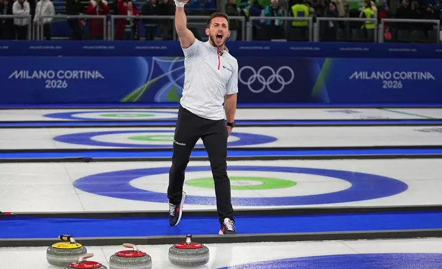 United States' Korey Dropkin reacts following the semi-finals round of the mixed doubles curling match against Italy, at the 2026 Winter Olympics, in Cortina d'Ampezzo, Italy, Monday, Feb. 9, 2026. (AP Photo/Fatima Shbair)