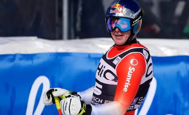 Switzerland's Franjo von Allmen reacts at the finish area, during a men's World Cup downhill race, in Garmisch Partenkirchen , Germany, Saturday, Feb. 28, 2026. (AP Photo/Giovanni Auletta)
