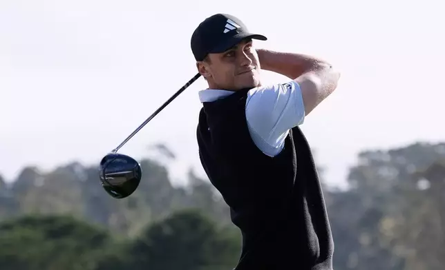 Ludvig Åberg, from Sweden, hits from the third tee at Pebble Beach Golf Links during the second round of the AT&amp;T Pebble Beach Pro-Am golf tournament in Pebble Beach, Calif., Friday, Feb. 13, 2026. (AP Photo/Godofredo A. Vásquez)