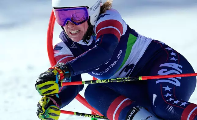 United States' A.J. Hurt speeds down the course, during an alpine ski, women's giant slalom race, at the 2026 Winter Olympics, in Cortina d'Ampezzo, Italy, Sunday, Feb. 15, 2026. (AP Photo/Robert F. Bukaty)