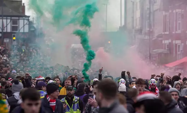Manchester United fans protest against the club's owners, the Glazer family, prior to the English Premier League soccer match between Manchester United and Fulham in Manchester, England, Sunday, Feb. 1, 2026. (AP Photo/Dave Thompson)