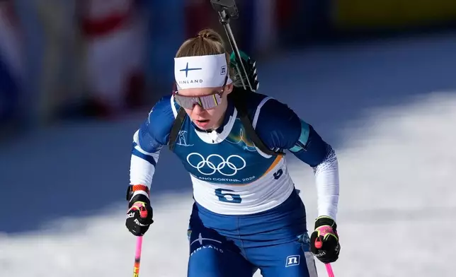 Suvi Minkkinen, of Finland, competes during the women's 10-kilometer pursuit biathlon race at the 2026 Winter Olympics in Anterselva, Italy, Sunday, Feb. 15, 2026. (AP Photo/Mosa'ab Elshamy)