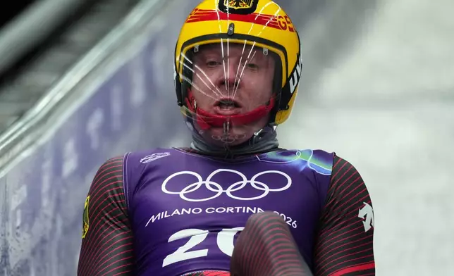 at the 2026 Winter Olympics, in Cortina d'Ampezzo, Italy, Thursday, Feb. 5, 2026. (AP Photo/Alessandra Tarantino)