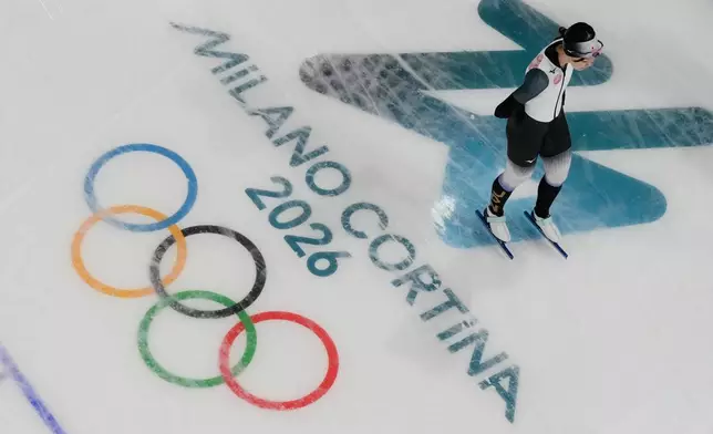 An athlete from Japan trains inside the speed skating venue at the 2026 Winter Olympics, in Milan, Italy, Thursday, Feb. 5, 2026. (AP Photo/David J. Phillip)