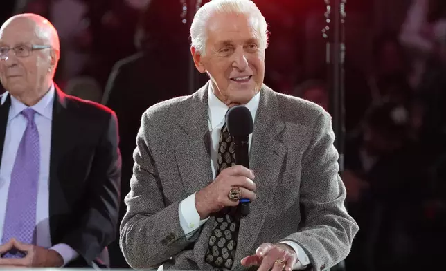 Former Miami Heat head coach Pat Riley recalls the 2006 season when the team won the NBA championship during a half time celebration Tuesday, Feb. 3, 2026, in Miami. (AP Photo/Marta Lavandier)