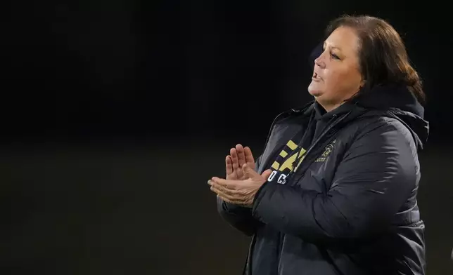 Plano East varsity soccer head coach Cristy Cooley reacts during a soccer game against Rock Hill, Jan. 30, 2026, in Murphy, Texas. (AP Photo/Julio Cortez)