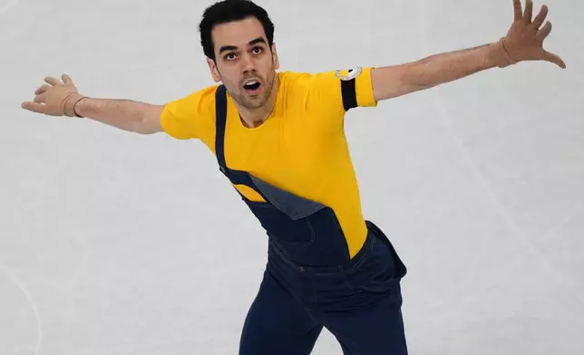 Tomas Guarino Sabate of Spain competes during the men's figure skating short program at the 2026 Winter Olympics, in Milan, Italy, Tuesday, Feb. 10, 2026. (AP Photo/Stephanie Scarbrough)