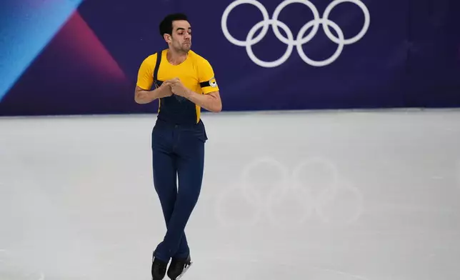 Tomas Guarino Sabate of Spain competes during the men's figure skating short program at the 2026 Winter Olympics, in Milan, Italy, Tuesday, Feb. 10, 2026. (AP Photo/Stephanie Scarbrough)