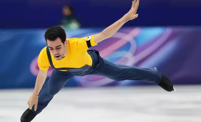 Tomas Guarino Sabate of Spain competes during the men's figure skating short program at the 2026 Winter Olympics, in Milan, Italy, Tuesday, Feb. 10, 2026. (AP Photo/Francisco Seco)