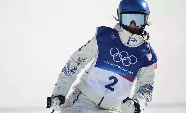 China's Eileen Gu reacts during the women's freestyle skiing halfpipe final at the 2026 Winter Olympics, in Livigno, Italy, Sunday, Feb. 22, 2026. (AP Photo/Abbie Parr)