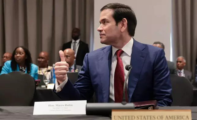 U.S. Secretary of State Marco Rubio gives a thumbs up during the Caribbean Community (CARICOM) plenary session in Basseterre, Saint Kitts and Nevis, Wednesday, Feb. 25, 2026. (Jonathan Ernst/Pool photo via AP)