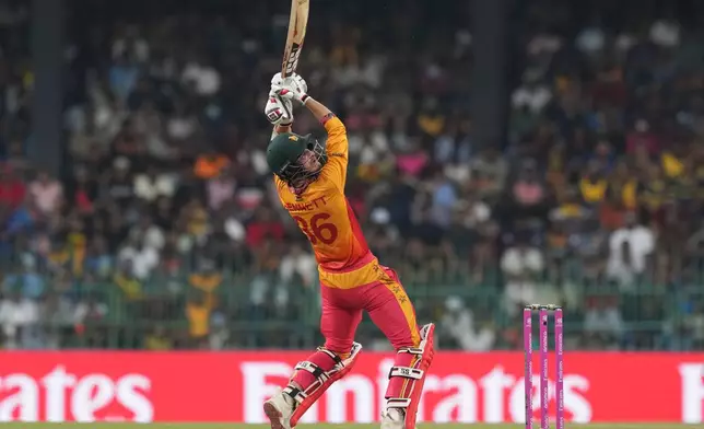 Zimbabwe's Brian Bennett plays a shot during the T20 World Cup cricket match between Sri Lanka and Zimbabwe in Colombo, Sri Lanka, Thursday, Feb. 19, 2026. (AP Photo/Eranga Jayawardena)