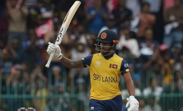 Sri Lanka's Pathum Nissanka celebrates his fifty runs during the T20 World Cup cricket match between Sri Lanka and Zimbabwe in Colombo, Sri Lanka, Thursday, Feb. 19, 2026. (AP Photo/Eranga Jayawardena)