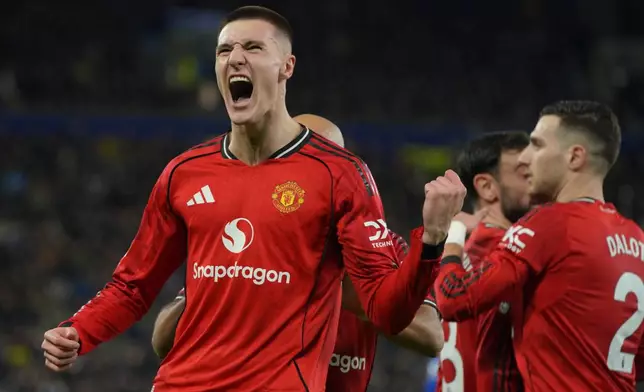 Manchester United's Benjamin Sesko celebrates after scoring during the Premier League soccer match between Manchester United and Everton in Liverpool, England, Monday, Feb. 23, 2026. (AP Photo/Ian Hodgson)