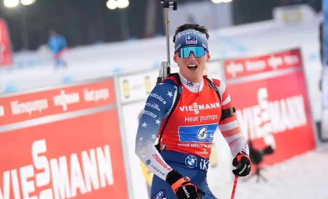 Maxime Germain, of the United States, reacts after crossing the finish line in fourth place in the 4X6 km mixed relay race at the Biathlon World World Cup in Nove Mesto na Morave, Czech Republic, Saturday, Jan. 24, 2026. (AP Photo/Petr David Josek)